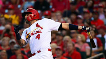 Aug 9, 2016; St. Louis, MO, USA; St. Louis Cardinals catcher Yadier Molina (4) hits a solo home run off of Cincinnati Reds starting pitcher Brandon Finnegan (not pictured) during the second inning at Busch Stadium. Mandatory Credit: Jeff Curry-USA TODAY Sports
