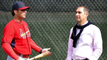 Feb 21, 2015; Jupiter, FL, USA; St. Louis Cardinals manager Mike Matheny (left) talks with Cardinals general manager John Mozeliak (right) during practice drills at Roger Dean Stadium. Mandatory Credit: Steve Mitchell-USA TODAY Sports