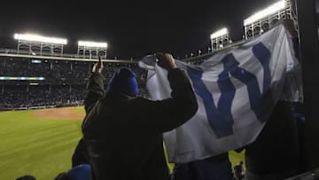 Oct 30, 2016; Chicago, IL, USA; Chicago Cubs fans celebrate after game five of the 2016 World Series against the Cleveland Indians at Wrigley Field. The Cubs defeated the Indians 3-2. Mandatory Credit: Tommy Gilligan-USA TODAY Sports