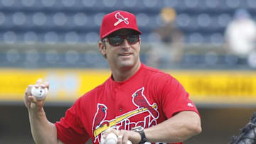 Jun 10, 2016; Pittsburgh, PA, USA; St. Louis Cardinals manager Mike Matheny (22) throws batting practice before playing the Pittsburgh Pirates at PNC Park. Mandatory Credit: Charles LeClaire-USA TODAY Sports