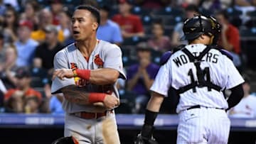 Sep 20, 2016; Denver, CO, USA; St. Louis Cardinals second baseman Kolten Wong (16) reacts after not being to score a run in the first inning against the Colorado Rockies at Coors Field. Mandatory Credit: Ron Chenoy-USA TODAY Sports