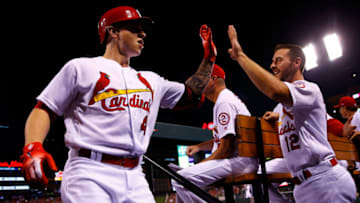 ST. LOUIS, MO - SEPTEMBER 11: Paul DeJong #12 of the St. Louis Cardinals congratulates Tyler O'Neill #41 of the St. Louis Cardinals after O'Neill's three-run home run against the Pittsburgh Pirates in the eighth inning at Busch Stadium on September 11, 2018 in St. Louis, Missouri. (Photo by Dilip Vishwanat/Getty Images)