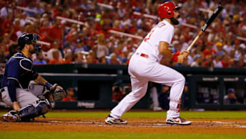 ST. LOUIS, MO - SEPTEMBER 24: Matt Carpenter #13 of the St. Louis Cardinals hits an RBI double against the Milwaukee Brewers in the third inning at Busch Stadium on September 24, 2018 in St. Louis, Missouri. (Photo by Dilip Vishwanat/Getty Images)