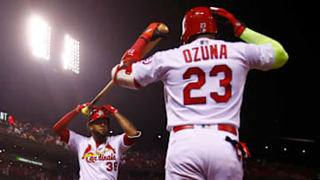 ST. LOUIS, MO - SEPTEMBER 24: Jose Martinez #38 of the St. Louis Cardinals celebrates with Marcell Ozuna #23 of the St. Louis Cardinals after hitting a home run against the Milwaukee Brewers in the sixth inning at Busch Stadium on September 24, 2018 in St. Louis, Missouri. (Photo by Dilip Vishwanat/Getty Images)