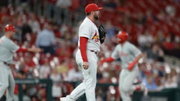 ST. LOUIS, MO - MAY 7: Dominic Leone #55 of the St. Louis Cardinals looks on as Rhys Hoskins #17 of the Philadelphia Phillies rounds the bases after hitting a solo homerun against the St. Louis Cardinals at Busch Stadium on May 7, 2019 in St. Louis, Missouri. The Phillies defeated the Cardinals 11-1. (Photo by Michael B. Thomas /Getty Images)
