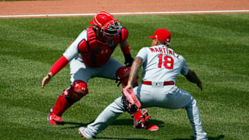 PITTSBURGH, PA - JULY 25: Matt Wieters #32 of the St. Louis Cardinals and Carlos Martinez #18 of the St. Louis Cardinals celebrates after defeating the Pittsburgh Pirates at PNC Park on July 25, 2019 in Pittsburgh, Pennsylvania. (Photo by Justin K. Aller/Getty Images)