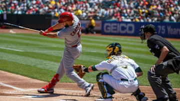 OAKLAND, CA - AUGUST 04: Matt Carpenter #13 of the St. Louis Cardinals hits a single against the Oakland Athletics during the first inning at the RingCentral Coliseum on August 4, 2019 in Oakland, California. (Photo by Jason O. Watson/Getty Images)