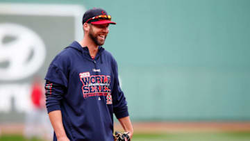 BOSTON, MA - OCTOBER 22: Chris Carpenter of the St. Louis Cardinals looks on during batting practice during 2013 World Series Media Day at Fenway Park on October 22, 2013 in Boston, Massachusetts. The Red Sox host the Cardinals in Game 1 on October 23, 2013. (Photo by Jared Wickerham/Getty Images)