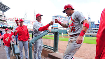 ATLANTA, GA - MAY 6: Kolten Wong #16 of the St. Louis Cardinals is congratulated by Manager Mike Matheney #22 after scoring a first inning run against the Atlanta Braves at SunTrust Park on May 6, 2017 in Atlanta, Georgia. (Photo by Scott Cunningham/Getty Images)