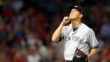 ANAHEIM, CA - JUNE 13: Giovanny Gallegos #30 of the New York Yankees looks on as he walks off the mound during the sixth inning of a game against the Los Angeles Angels of Anaheim at Angel Stadium of Anaheim on June 13, 2017 in Anaheim, California. (Photo by Sean M. Haffey/Getty Images)