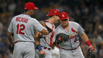 PITTSBURGH, PA - SEPTEMBER 22: Carson Kelly #30 of the St. Louis Cardinals celebrates with Juan Nicasio #12 and Luke Voit #40 after defeating the Pittsburgh Pirates at PNC Park on September 22, 2017 in Pittsburgh, Pennsylvania. (Photo by Justin K. Aller/Getty Images)