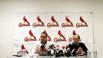 JUPITER, FL - FEBRUARY 16: General Manager John Mozeliak (L) and owner William DeWitt, Jr. of the St. Louis Cardinals speak at a press conference at Roger Dean Stadium on February 16, 2011 in Jupiter, Florida. (Photo by Marc Serota/Getty Images)