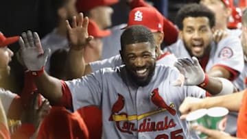 CHICAGO, IL - JULY 10: Dexter Fowler #25 of the St. Louis Cardinals celebrates in the dugout after hitting a grand slam home run in the 6th inning against the Chicago White Sox at Guaranteed Rate Field on July 10, 2018 in Chicago, Illinois. (Photo by Jonathan Daniel/Getty Images)