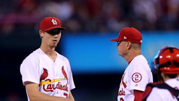 ST. LOUIS, MO - AUG 1: Luke Weaver #7 of the St. Louis Cardinals hands the ball to Manager Mike Shildt #8 as he is removed from the mound during the third inning against the Colorado Rockies at Busch Stadium on August 1, 2018 in St. Louis, Missouri. (Photo by Scott Kane/Getty Images)