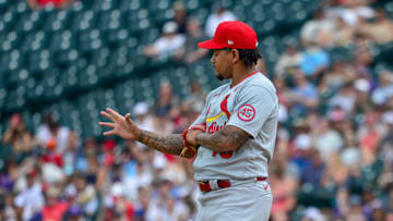 Carlos Martinez #18 of the St. Louis Cardinals reacts after an apparent arm injury while pitching against the Colorado Rockies at Coors Field on July 4, 2021 in Denver, Colorado. (Photo by Dustin Bradford/Getty Images)