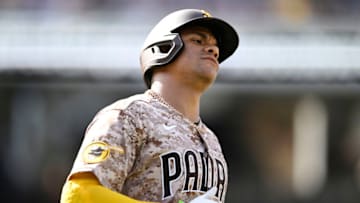 Juan Soto #22 of the San Diego Padres runs to first base. (Photo by Denis Poroy/Getty Images)