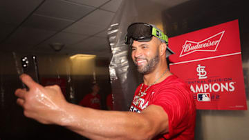 MILWAUKEE, WISCONSIN - SEPTEMBER 27: Albert Pujols #5 of the St. Louis Cardinals celebrates clinching the National League Central Division after defeating the Milwaukee Brewers at American Family Field on September 27, 2022 in Milwaukee, Wisconsin. (Photo by Stacy Revere/Getty Images)