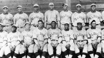 ST. LOUIS - 1930. The Negro League team the St. Louis Stars pose for a portrait in 1930. Hall of Fame members are Mule Suttles, standing, far left, Cool Papa Bell, sitting, fourth from right, and Willie Wells, standing second from left. (Photo by Mark Rucker/Transcendental Graphics, Getty Images)