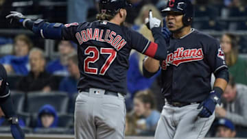 KANSAS CITY, MO - SEPTEMBER 28: Josh Donaldson #27 of the Cleveland Indians celebrates his grand slam with Edwin Encarnacion #10 in the seventh inning against the Kansas City Royals at Kauffman Stadium on September 28, 2018 in Kansas City, Missouri. (Photo by Ed Zurga/Getty Images)