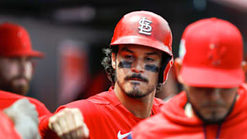Nolan Arenado (28) celebrates with teammates after scoring in the second inning of the game against the Washington Nationals during spring training at Roger Dean Stadium. Mandatory Credit: Sam Navarro-USA TODAY Sports