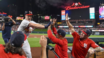 Aug 28, 2022; St. Louis Cardinals left fielder Tyler O'Neill (27) celebrates with after hitting a go ahead three run home run against the Atlanta Braves. Mandatory Credit: Jeff Curry-USA TODAY Sports