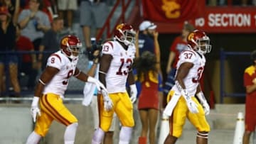 Oct 11, 2014; Tucson, AZ, USA; Southern California Trojans running back Javorius Allen (37) celebrates with wide receiver JuJu Smith (9) and tight end Bryce Dixon (13) after scoring a touchdown against the Arizona Wildcats at Arizona Stadium. Mandatory Credit: Mark J. Rebilas-USA TODAY Sports