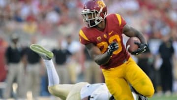 September 12, 2015; Los Angeles, CA, USA; Southern California Trojans running back Tre Madden (23) runs the ball for a touchdown against the Idaho Vandals during the first half at Los Angeles Memorial Coliseum. Mandatory Credit: Gary A. Vasquez-USA TODAY Sports