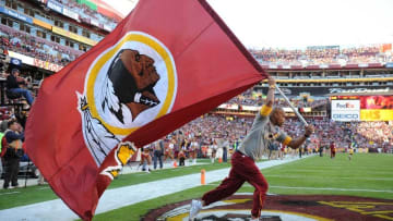 Nov 15, 2015; Landover, MD, USA; Washington Redskins flag is run onto the field after a score against the New Orleans Saints during the first half at FedEx Field. Mandatory Credit: Brad Mills-USA TODAY Sports