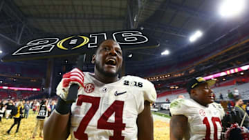 Jan 11, 2016; Glendale, AZ, USA; Alabama Crimson Tide offensive lineman Cam Robinson (74) and linebacker Reuben Foster (10) celebrate after defeating the Clemson Tigers in the 2016 CFP National Championship at University of Phoenix Stadium. Mandatory Credit: Mark J. Rebilas-USA TODAY Sports