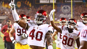 Sep 26, 2015; Tempe, AZ, USA; Southern California Trojans linebacker Jabari Ruffin (40) and wide receiver Deontay Burnett (80) celebrate following the game against the Arizona State Sun Devils at Sun Devil Stadium. Mandatory Credit: Mark J. Rebilas-USA TODAY Sports