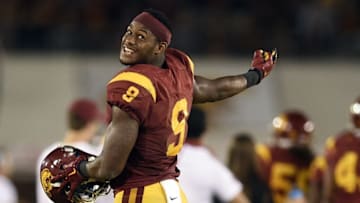 Oct 24, 2015; Los Angeles, CA, USA; Southern California Trojans wide receiver JuJu Smith-Schuster (9) celebrates during the fourth quarter against the Utah Utes at Los Angeles Memorial Coliseum. The Southern California Trojans won 42-24. Mandatory Credit: Kelvin Kuo-USA TODAY Sports