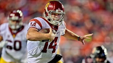 Sep 23, 2016; Salt Lake City, UT, USA; USC Trojans quarterback Sam Darnold (14) rushes against the Utah Utes during the second half at Rice-Eccles Stadium. Mandatory Credit: Kirby Lee-USA TODAY Sports