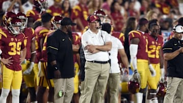 Oct 1, 2016; Los Angeles, CA, USA; Southern California Trojans head coach Clay Helton (center) stands on the sidelines during the second half against the Arizona State Sun Devils at Los Angeles Memorial Coliseum. Mandatory Credit: Kelvin Kuo-USA TODAY Sports