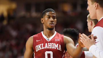 LUBBOCK, TX - FEBRUARY 13: Christian James #0 of the Oklahoma Sooners is congratulated by teammates during the game against the Texas Tech Red Raiders on February 13, 2018 at United Supermarket Arena in Lubbock, Texas. Texas Tech defeated Oklahoma 88-78. (Photo by John Weast/Getty Images)