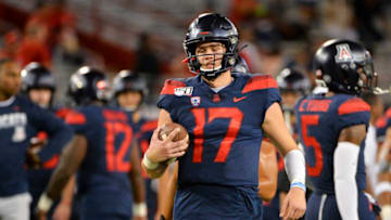 Sep 28, 2019; Tucson, AZ, USA; Arizona Wildcats quarterback Grant Gunnell (17) warms up before the game against the UCLA Bruins at Arizona Stadium. Mandatory Credit: Casey Sapio-USA TODAY Sports