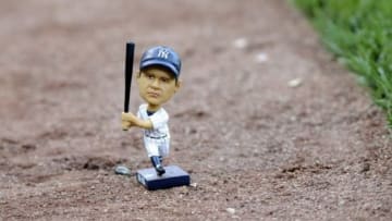 Sep 1, 2015; Boston, MA, USA; A bobble head doll of Babe Ruth on the field prior to a game between the Boston Red Sox and New York Yankees at Fenway Park. Mandatory Credit: Bob DeChiara-USA TODAY Sports
