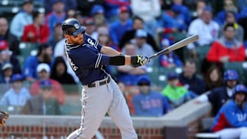 Apr 18, 2015; Chicago, IL, USA; San Diego Padres third baseman Will Middlebrooks (11) hits an RBI double during the ninth inning against the Chicago Cubs at Wrigley Field. Mandatory Credit: Dennis Wierzbicki-USA TODAY Sports