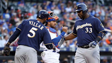 May 20, 2016; New York City, NY, USA; Milwaukee Brewers first baseman Chris Carter (33) and Milwaukee Brewers shortstop Jonathan Villar (5) celebrate Carter