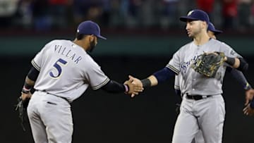 Sep 26, 2016; Arlington, TX, USA; Milwaukee Brewers second baseman Jonathan Villar (5) and left fielder Ryan Braun (8) celebrate after the game against the Texas Rangers at Globe Life Park in Arlington. Mandatory Credit: Kevin Jairaj-USA TODAY Sports