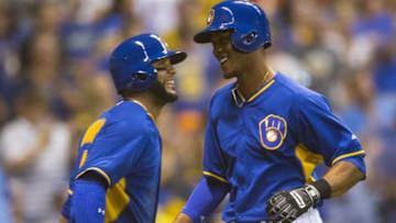 Jun 24, 2016; Milwaukee, WI, USA; Milwaukee Brewers pinch hitter Keon Broxton (23) celebrates with shortstop Jonathan Villar (5) after hitting a home run during the fifth inning against the Washington Nationals at Miller Park. Mandatory Credit: Jeff Hanisch-USA TODAY Sports