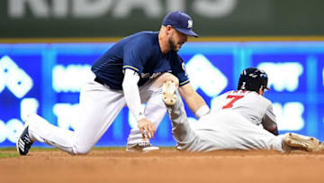 MILWAUKEE, WI - JULY 24: Trea Turner #7 of the Washington Nationals is tagged out at second base by Travis Shaw #21 of the Milwaukee Brewers during the tenth inning of a gameat Miller Park on July 24, 2018 in Milwaukee, Wisconsin. (Photo by Stacy Revere/Getty Images)
