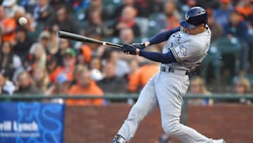 SAN FRANCISCO, CA - JULY 28: Christian Yelich #22 of the Milwaukee Brewers hits a two-run rbi single against the San Francisco Giants in the top of the second inning at AT&T Park on July 28, 2018 in San Francisco, California. (Photo by Thearon W. Henderson/Getty Images)