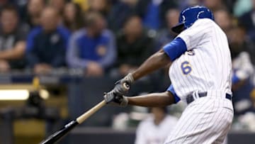 MILWAUKEE, WI - SEPTEMBER 29: Lorenzo Cain #6 of the Milwaukee Brewers hits a single in the third inning against the Detroit Tigers at Miller Park on September 29, 2018 in Milwaukee, Wisconsin. (Photo by Dylan Buell/Getty Images)