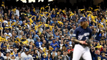 MILWAUKEE, WI - OCTOBER 12: Fans cheer as Josh Hader #71 of the Milwaukee Brewers prepares to throw a pitch against the Los Angeles Dodgers during the sixth inning in Game One of the National League Championship Series at Miller Park on October 12, 2018 in Milwaukee, Wisconsin. (Photo by Stacy Revere/Getty Images)