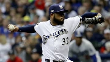 MILWAUKEE, WI - OCTOBER 20: Jeremy Jeffress #32 of the Milwaukee Brewers throws a pitch against the Los Angeles Dodgers during the sixth inning in Game Seven of the National League Championship Series at Miller Park on October 20, 2018 in Milwaukee, Wisconsin. (Photo by Jonathan Daniel/Getty Images)