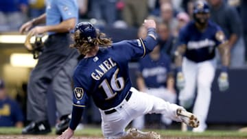 MILWAUKEE, WISCONSIN - MAY 04: Ben Gamel #16 of the Milwaukee Brewers slides into home plate to score a run in the third inning against the New York Mets at Miller Park on May 04, 2019 in Milwaukee, Wisconsin. (Photo by Dylan Buell/Getty Images)