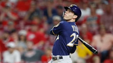 CINCINNATI, OH - JULY 01: Christian Yelich #22 of the Milwaukee Brewers hits a two-run home run to extend his team's lead in the ninth inning against the Cincinnati Reds at Great American Ball Park on July 1, 2019 in Cincinnati, Ohio. The Brewers won 8-6. (Photo by Joe Robbins/Getty Images)