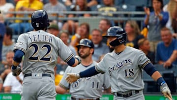 PITTSBURGH, PA - AUGUST 05: Christian Yelich #22 of the Milwaukee Brewers celebrates with Keston Hiura #18 after hitting a home run in the first inning against the Pittsburgh Pirates at PNC Park on August 5, 2019 in Pittsburgh, Pennsylvania. (Photo by Justin K. Aller/Getty Images)