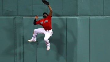 BOSTON, MASSACHUSETTS - SEPTEMBER 09: Jackie Bradley Jr. #19 of the Boston Red Sox catches a fly ball hit by Edwin Encarnacion #30 of the New York Yankees during the seventh inning of the game between the Boston Red Sox and the New York Yankees at Fenway Park on September 09, 2019 in Boston, Massachusetts. (Photo by Maddie Meyer/Getty Images)