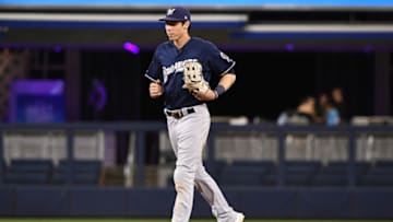 MIAMI, FLORIDA - SEPTEMBER 09: Christian Yelich #22 of the Milwaukee Brewers runs off the field after beating the Miami Marlins at Marlins Park on September 09, 2019 in Miami, Florida. (Photo by Mark Brown/Getty Images)